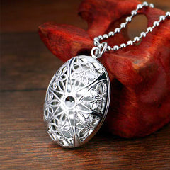 High-Quality Platinum-Plated Oval Photo Locket Necklace - Hollow Vintage Celtic Star Flowers Design, Custom Photo & Text, Memory Gifts for Men Women